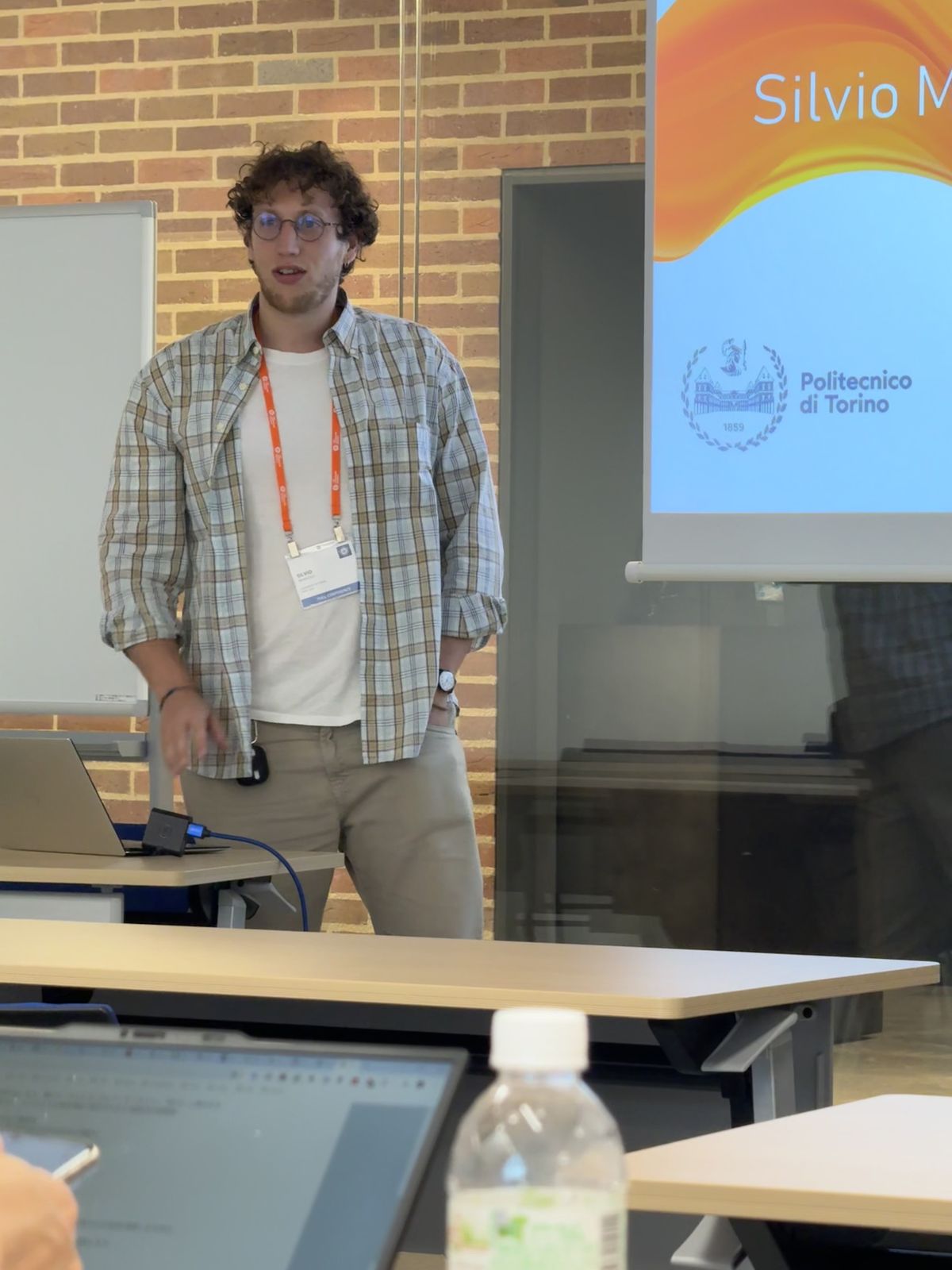 Silvio Meneguzzo presenting a paper at COMPSAC 2026 in Madrid