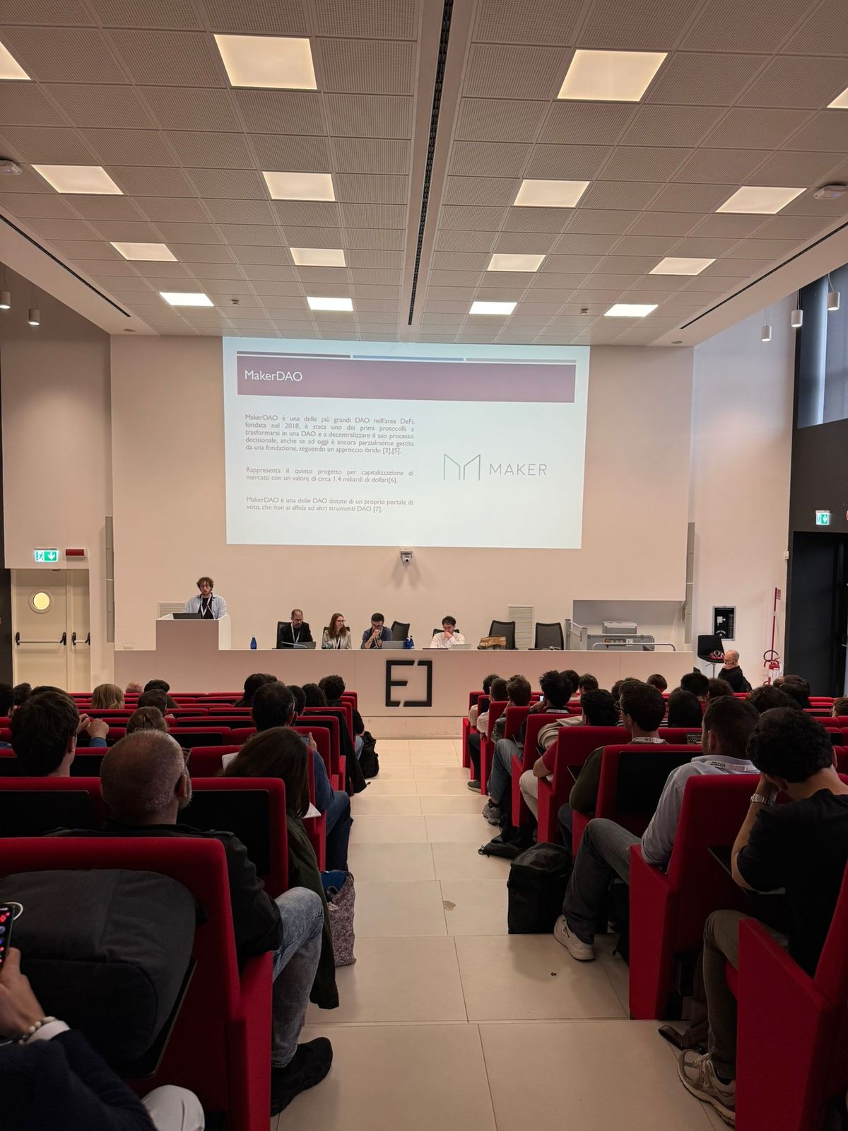 Full auditorium during the DAO e Società talk at Politecnico di Torino