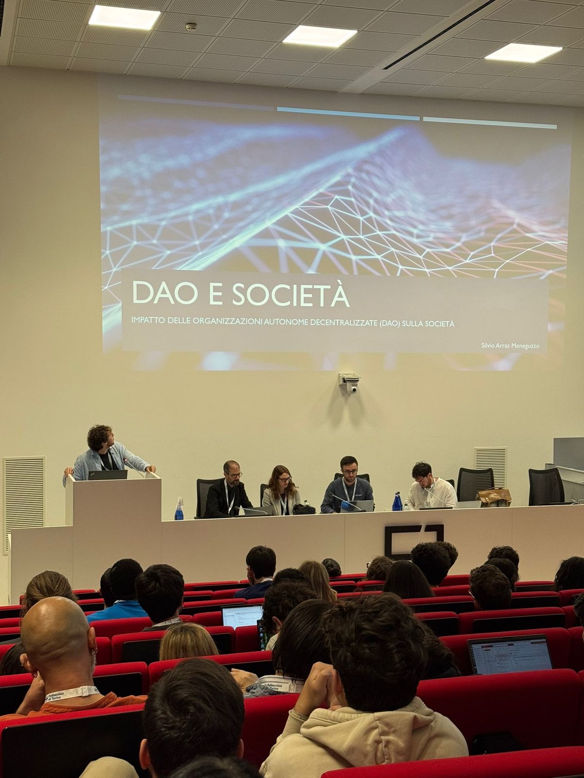 Title slide of the invited talk DAO e Società at the CrypTO Conference 2025